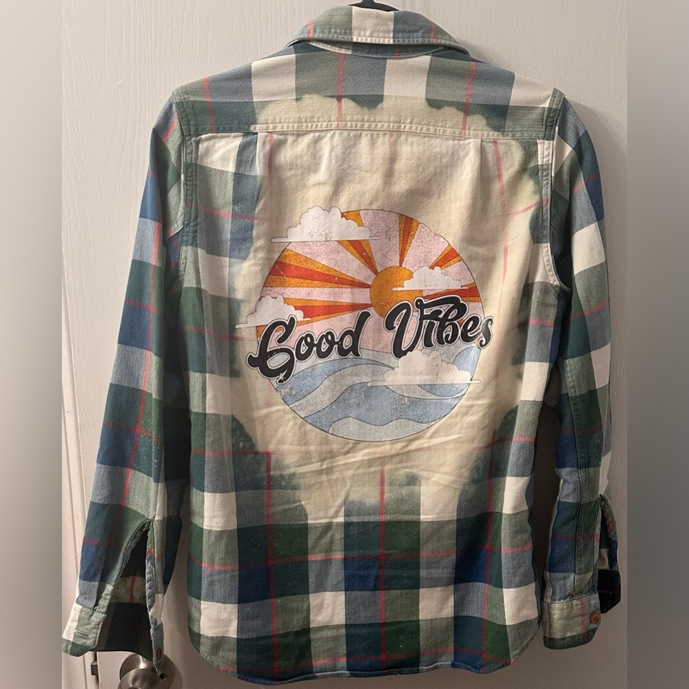 Upcycled men’s flannel with graphic on back.  Men’s XS